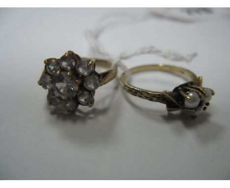 A 9ct Gold Cluster Dress Ring, of flowerhead design, claw set; together with another ring high claw set. (2)