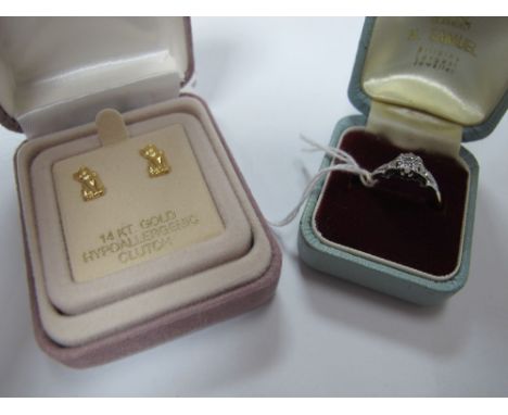 An 18ct Gold Single Stone Ring, illusion set; together with a pair of cat stud earrings.