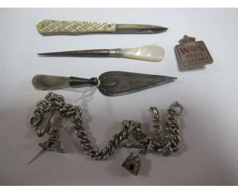 A Hallmarked Silver and Polished Hardstone Trowel Book Mark, a hallmarked silver and mother or pearl folding fruit knife, cur