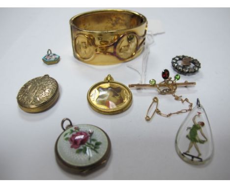 A Bar Brooch, oval and circular collet set, on bar indistinctly stamped "9ct"; an Aesthetic style bangle, an enamel locket pe