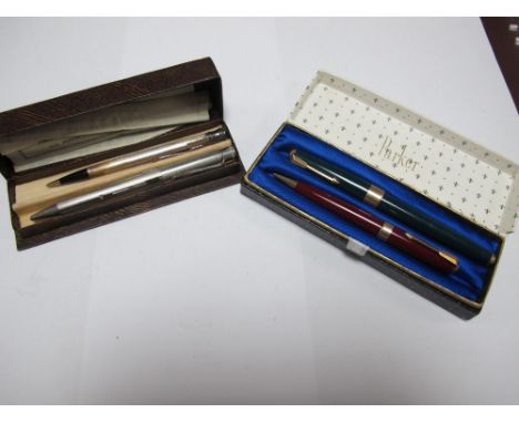A Four Colour Sliding Pencil, engine turned, stamped "Brit. Pat. No. 381028", Parker 17 hooded nib ink pen, Parker 17 pencil,