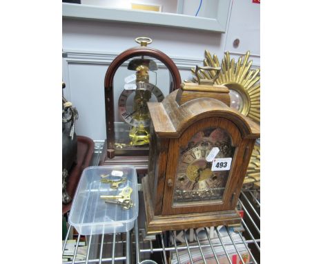 A Warmink Oak Cased Mantel Clock, Frank Hermle skeleton type clock.