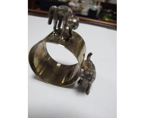 A Novelty Hallmarked Silver Napkin Ring, with applied dog and cat, in original fitted case. 