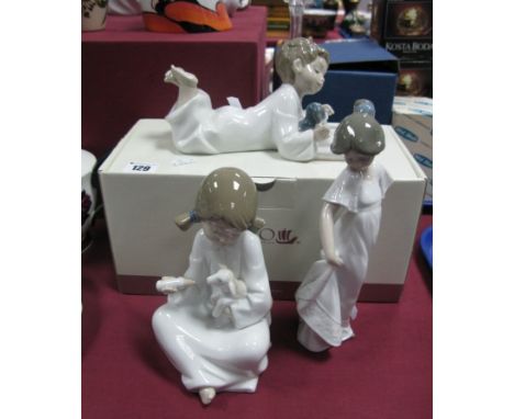 Three Nao Figures - Repeat After Me, boxed, Girl Feeding a Lamb and another of a young girl. (3)