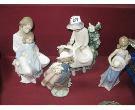 Two Lladro Figures; together with two Nao figures. (4)