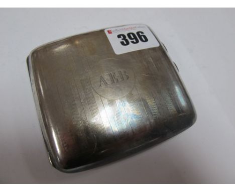 A Hallmarked Silver Cigarette Case, of cushion shape, engine turned and initialled "A.E.B". 