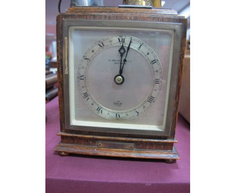 H. L. Brown & Son Ltd Sheffield; An Oak Cased Elliott Mantel Clock, the signed dial with black Roman numerals, the case with 