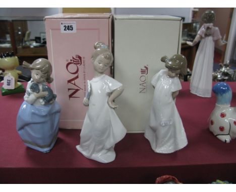 Three Nao Figures - Girl with Puppy, Girl with Fan and another (two boxed). (3)