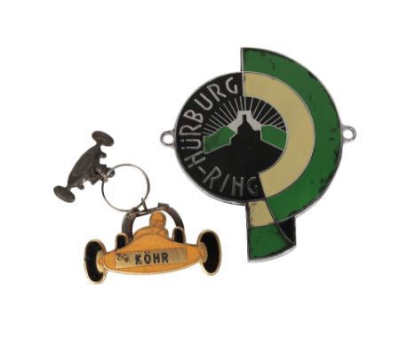 NURBURGRING SOUVENIR CAR BADGE c1960s Together with an enamel racing car lapel-badge and a Shell Oil Co key-fob in the form o