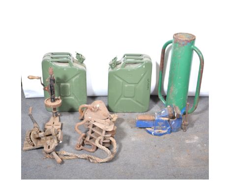 Two block pulleys, two metal jerry cans, hand drill, post rammer and a Record No 4 bench vice.