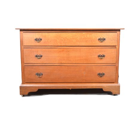 Oak chest of drawers, rectangular top, three long drawers, bracket feet, width 122cm, depth 54cm, height 81cm.