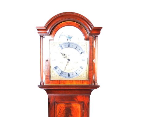 Modern mahogany longcase clock, arched hood with cavetto cornice, turned columns, long door with bullseye glass, bracket feet