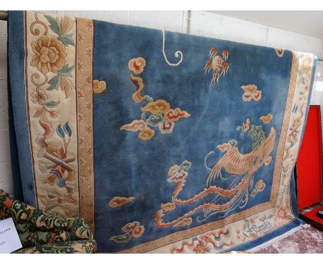 Large Oriental themed wool carpet