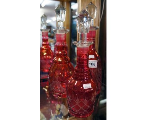 3 ruby glass decanters