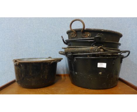Assorted vintage enamelled jam pans, etc. 