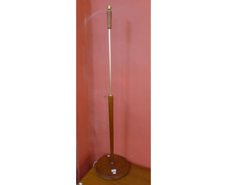 A teak standard lamp 
