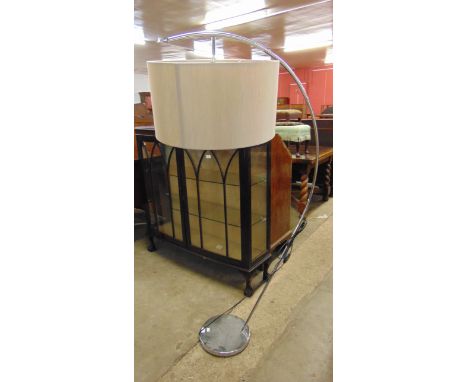 A chrome floor standing arc lamp 