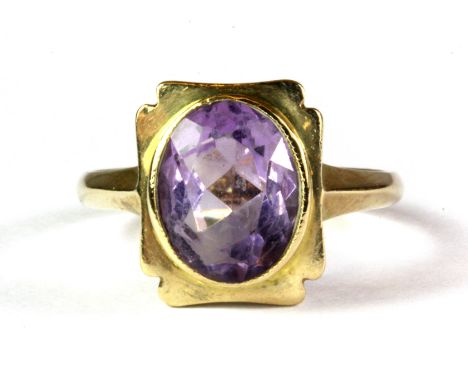 A 9ct yellow gold amethyst set ring, (N.5).