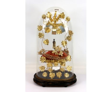 A 19th century French marriage stand under glass dome, ( globe de mariee ) H. 52cm.