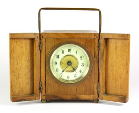 An early 20th century brass and olive wood carriage clock, H. 12cm.