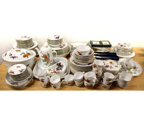 A large collection of Royal Worcester "Evesham" pattern dinner and coffee china.