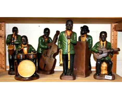 A group of five ceramic musician figures, tallest H. 35cm.
