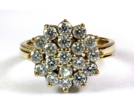 A 9ct yellow gold stone set cluster ring, (K).