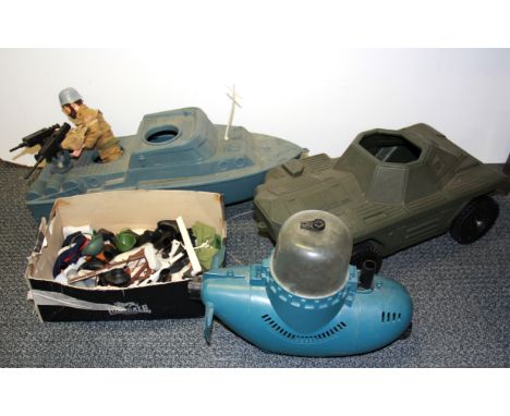 A quantity of old Action Man toys and vehicles.