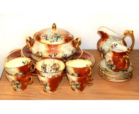 A quantity of K & K Roseberry studios hand painted tea and dinner china.