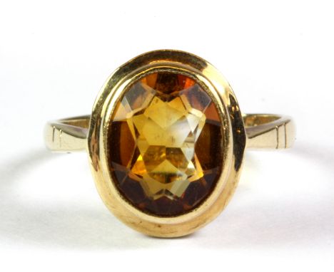 A 9ct yellow gold citrine set ring, (K.5).
