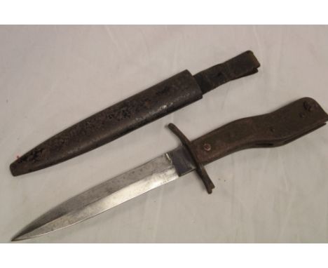 A First War German Demag bayonet/fighting knife with double-edged blade marked "Demag Duisburg" in steel scabbard