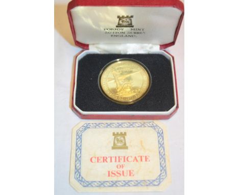 A 1977 gold-plated sterling silver medallion "To commemorate the first scheduled passenger service - Concorde - London - New 