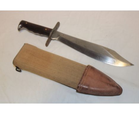 A First War United States machine gunners bolo knife  with 9½" steel blade dated 1917 in canvas covered broad scabbard
