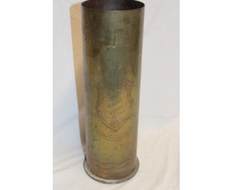 A First War brass trench art shell case engraved "The Great War 1914-1918" depicting angel figures