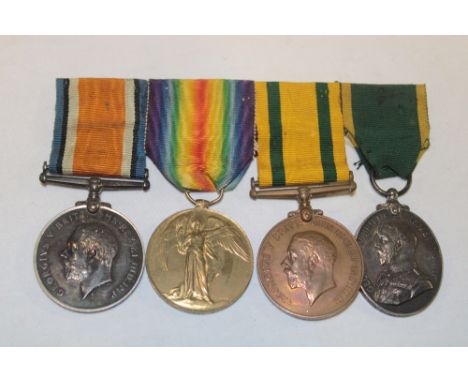 A Group of four medals awarded to No. 4411/201302 Pte. H. Hawken - 4/DCLI:- First War pair of medals, Territorial Force War m