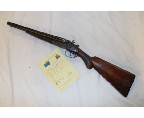 A deactivated 12-bore double barrel hammer shotgun by K D Radcliffe with shortened barrels and EU deactivation certificate