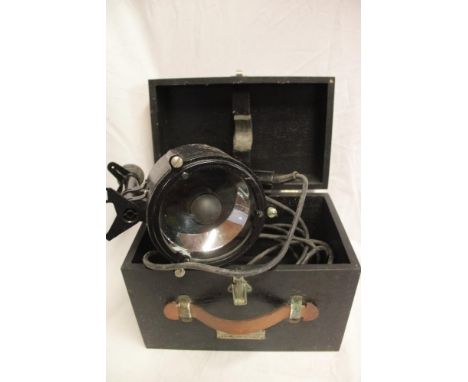A Naval painted metal hand-held signalling lamp in fitted case