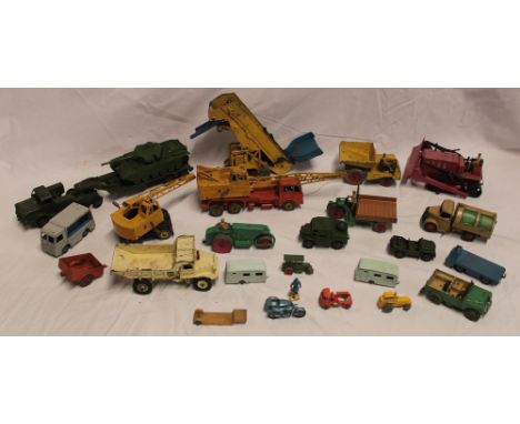 A selection of various Dinky die-cast vehicles including 20 ton Lorry mounted Crane, Tank Transporter with Tank, Field Artill