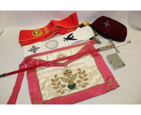 An embroidered Masonic apron, sash, Masonic sword, hat etc.