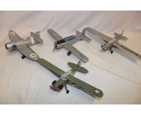 Four various wooden scale built aircraft