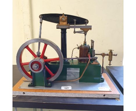 A Stuart beam engine, 27 cm high, on a plinth base, and with Constructional Details booklet (2) 