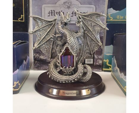 A boxed Myth and Magic figure, OY2006 Dragonlord, 3411 Bridge over the Abyss, CC16 Power of the Beast, 3153 The Artist, 4041 