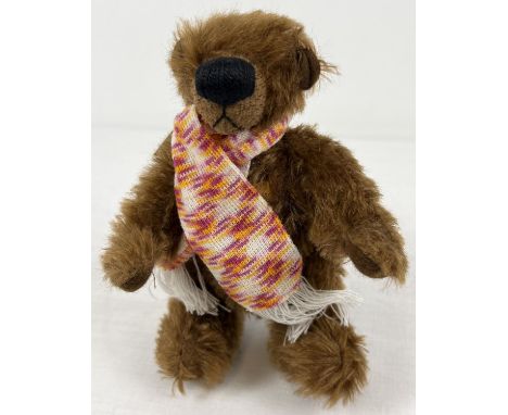 An 8" Limited Edition fully jointed mohair Grisly German teddy bear, named Perja. With knitted scarf. Designed by Corinna Sie
