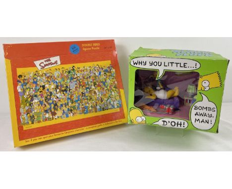 A sealed "The Simpsons" double sided jig-saw puzzle together with a boxed novelty Simpsons talking radio alarm clock.