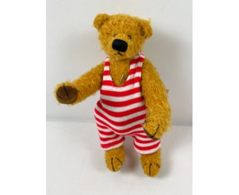 An 8" Limited Edition fully jointed mohair Grisly German teddy bear named Marco. With red striped bathing suit, complete with