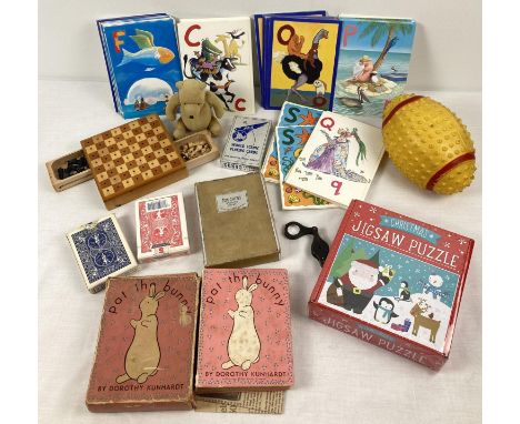 A box of assorted vintage and more modern toys and games. To include boxed 1940 'Pat the Bunny' book, PAA World Scenic Playin