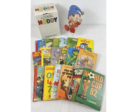 A boxed ceramic Noddy money box together with a collection of 18 assorted Ladybird books. 