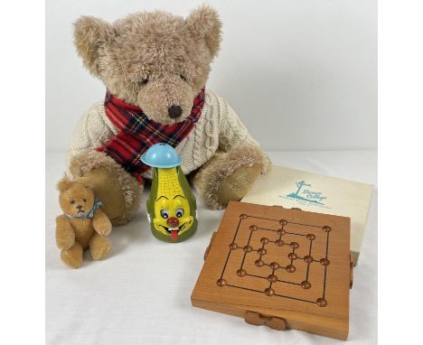 2 teddy bears together with 2 other vintage toys. A 2002 Harrods teddy bear with knitted jumper &amp; scarf; a Marx Toys, D. 