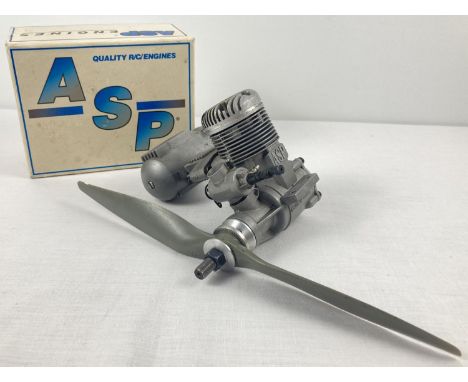 An ASP 120 AR 2-stroke engine with 13 x 8 propeller attached. Engine complete with original box and engine running &amp; care