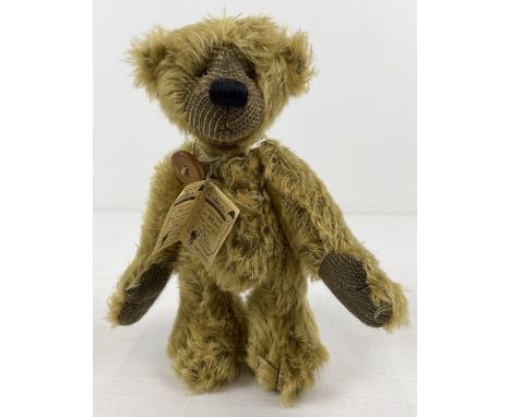 A 10.5" Limited Edition, fully jointed, mohair Grisly German teddy bear, named Buttons. With button on string necklace. Compl